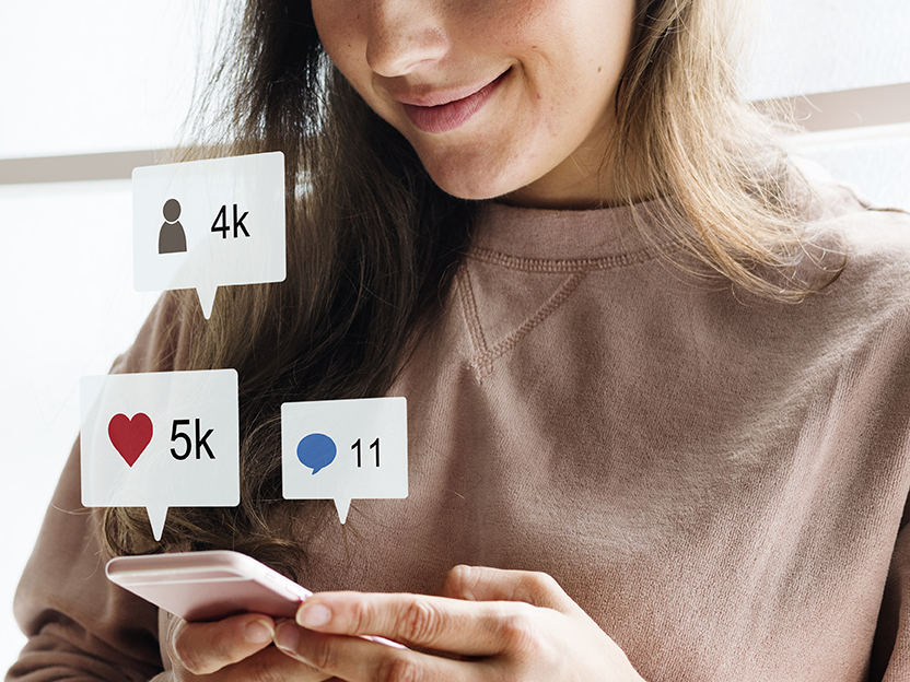 Woman using a smartphone social media conecpt